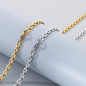 Detailed view of 5mm hollow square box chain in gold and silver finish links
