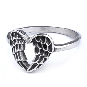 Retro stainless steel ring featuring detailed carved feather wings in a heart shape