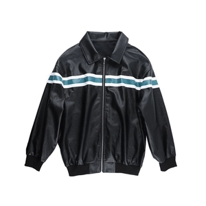 Detail of black faux leather jacket featuring blue and white horizontal stripes and zipper
