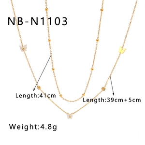 Detailed view of dual-layer gold butterfly necklace with 41cm and 39cm length specs