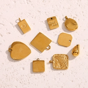 Collection of gold 18K plated stainless steel charms in heart and teardrop shapes