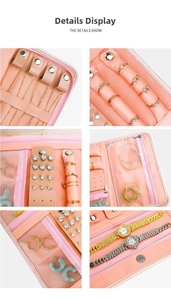 Pink PU leather jewelry organizer showing necklace hooks, ring rolls, and earring panel