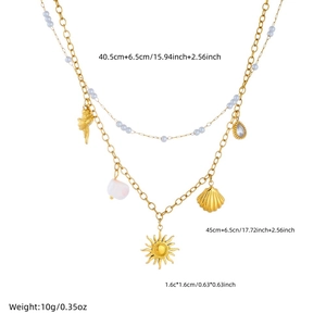 Double layered stainless steel necklace with shell starfish and pearl pendants in gold