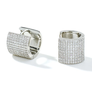 Elegant huggie hoop earrings featuring micro-pave white cubic zirconia in silver plating