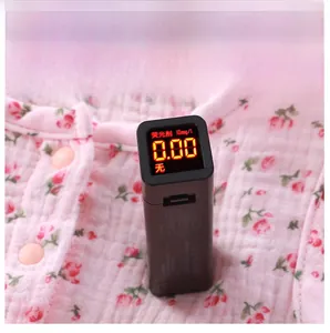 Close-up of pink floral baby gauze pajamas with zero fluorescent agent test result