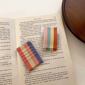 Matte candy color bobby pins set for girls on a vintage book, sweet hair accessories