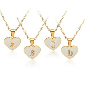 Golden heart pendant necklace with white shell initials A B C D displayed on white background