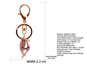 Detailed view of cat keychain dimensions showing zinc alloy and pink crystal rhinestone size