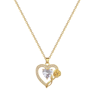 Elegant gold heart pendant necklace with sparkling crystals and delicate rose detail