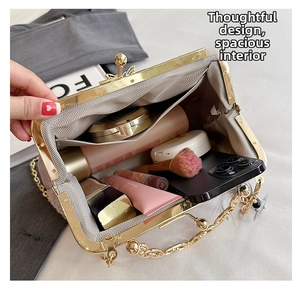 Top view of pink shell bag interior showing spacious storage for phone and cosmetics