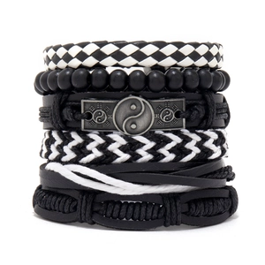 Men's multilayer woven bracelet set featuring black and white beads and Yin Yang charm