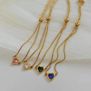 Adjustable gold heart bracelets with colorful zircon stones in pink, green, and blue