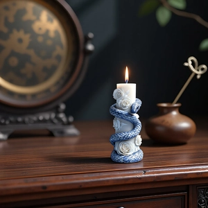 Antique snake and white rose relief candle mold with blue porcelain texture patterns