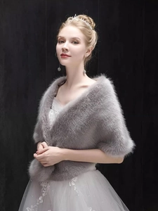 Close-up of grey faux fur bridal shawl showing soft texture for wedding dresses