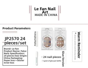 French tip press-on nail kit with pink glitter, black hearts, and 24-piece glue set