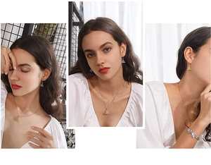 Close-up of a model wearing the Celtic knot necklace and triangle drop earrings set