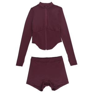 Flat lay of wine red yoga set featuring long sleeve zip top and high waist slim shorts