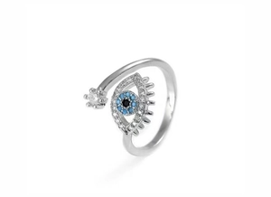 Detailed macro view of the silver evil eye open ring with blue and white zircons