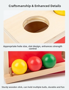 Detail of wooden educational toy featuring smooth colorful balls and secure slots
