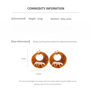 Detailed size and material specification chart for vintage resin tiger head earrings
