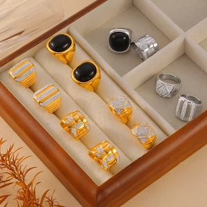 Minimalist titanium steel gold plated rings with black agate and zircon in a jewelry box