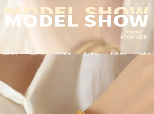 Detailed view of a gold-tone minimalist elastic cuff bracelet worn on a model's wrist