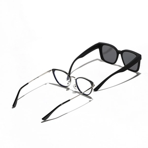 Polarized clip-on sunglasses set with silver metal frame and black resin fashion lenses