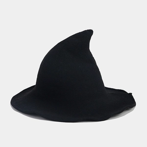 Detail of black knitted witch hat showing high-quality pointed design for Halloween costumes