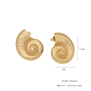 Detailed view of golden nautilus earrings in stainless steel with 2.6cm height measurements