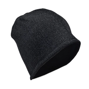 Close-up of winter knit beanie showing dark gray reflective yarn and warm fabric texture