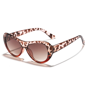 Classic tortoise shell sunglasses with oversized oval frames and gradient brown lenses