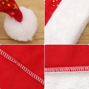 Red velvet Christmas hat with gold star patterns and white plush trim for holiday parties