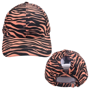 Detail of tiger stripe ponytail baseball cap with orange patterns and metal buckle