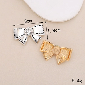 Bow-shaped metal shoe charms with pearl and crystal details, 3cm width for DIY crafts