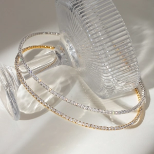 Luxe stainless steel tennis necklace set in gold and silver finish with white zircon