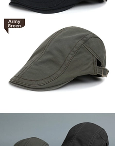 Detail of army green and black beret hats with adjustable side metal buckles and stitching