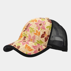 Detail of floral straw weave trucker hat with breathable black mesh and curved brim