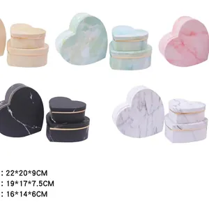 Three-piece heart-shaped marble pattern gift box set with elegant gold rim accents