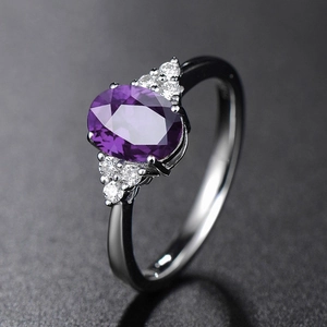 Vintage style gunmetal ring with oval purple gemstone and side zircon accents