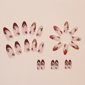 French style almond false nails with autumn leaf patterns in dark brown and nude pink tones