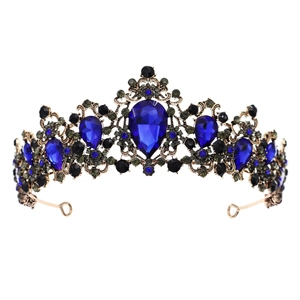 Baroque bridal crown with navy blue teardrop gemstones and vintage gold metal base