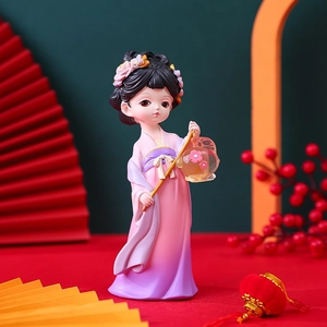 Hanfu girl figurine with pink-purple dress and lantern in a festive Chinese-style setting
