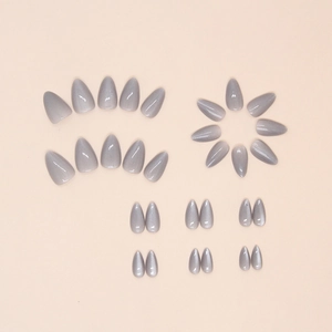 Silver grey cat eye almond shaped press-on nails set with 24 pieces in various sizes