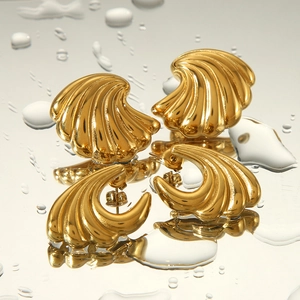 Polished gold wave stud earrings set for women with reflective water mirror effect