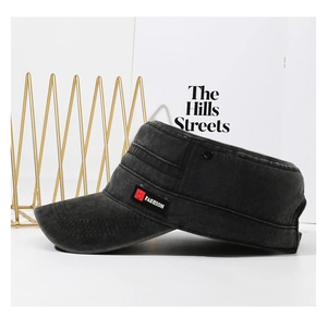 Detail view of washed black cotton cadet hat featuring side fashion embroidery patch