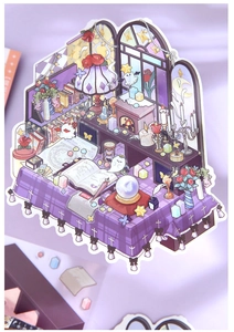 Close-up of purple magic house themed 3D stickers with crystal ball and book details