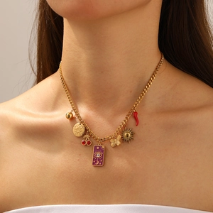 Gold-plated stainless steel necklace featuring colorful moon and sun charms on a model