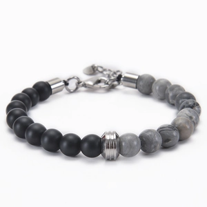 Detail of 8mm map stone beads with matte black beads and stainless steel lobster clasp
