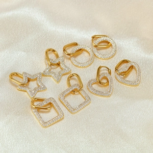 Golden stainless steel drop earrings with heart, star, and geometric pave crystal charms