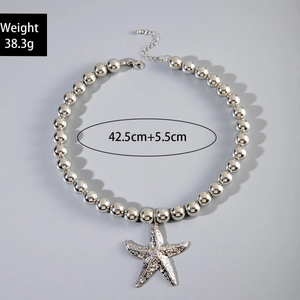 Detailed view of silver beaded starfish pendant necklace with length and weight specifications